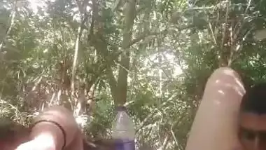 Mistress lets her servant lick her pussy during outdoor sex