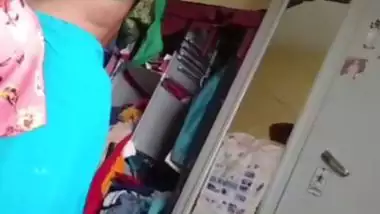 Grandmother wearing blouse and showing naked boobs