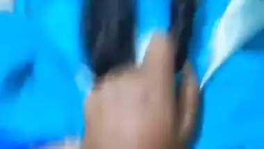Desi chudai of Bhabhi lying on bed in blue saree